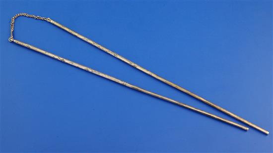 A pair of sterling silver chopsticks, 9in.